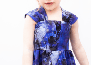 Tutorial showing how to add snaps or buttons to the bodice of the Reverie Dress printable PDF sewing pattern by Goober Pea Designs. For babies, toddlers, kids, girls. Sizes 6-12m to 14 youth. 