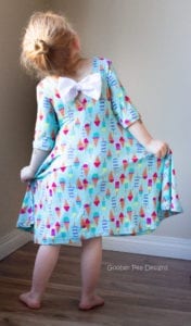 An easy to follow tutorial showing how to combine two PDF sewing patterns to make an adorable bow back dress for babies / toddlers / girls. Multiple sleeve lengths and sleeveless option. Slim skirt or full skirt.